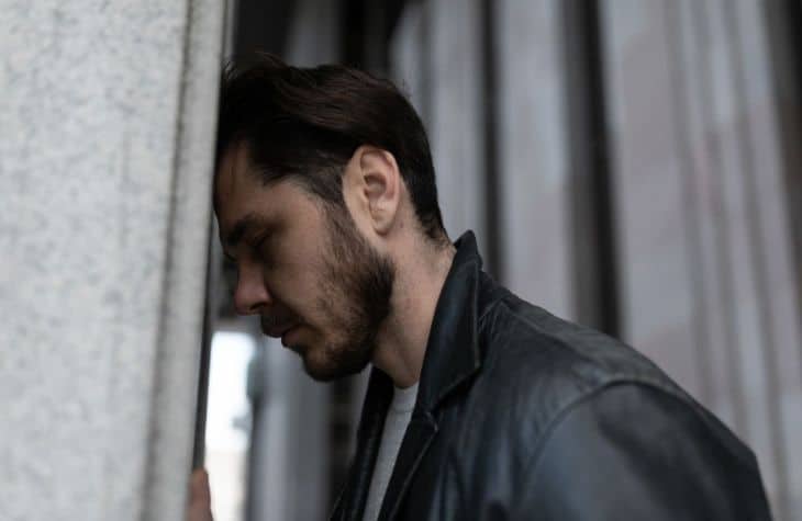 A photo of man who seems to be lacking motivation a sign of marijuana abuse
