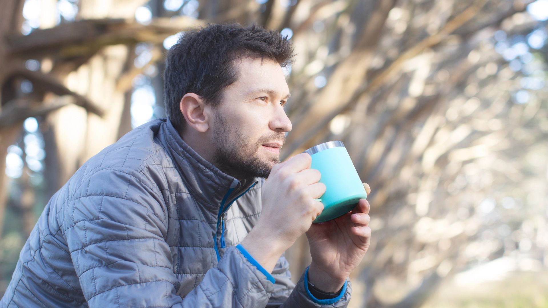 man enjoying his drink outdoor