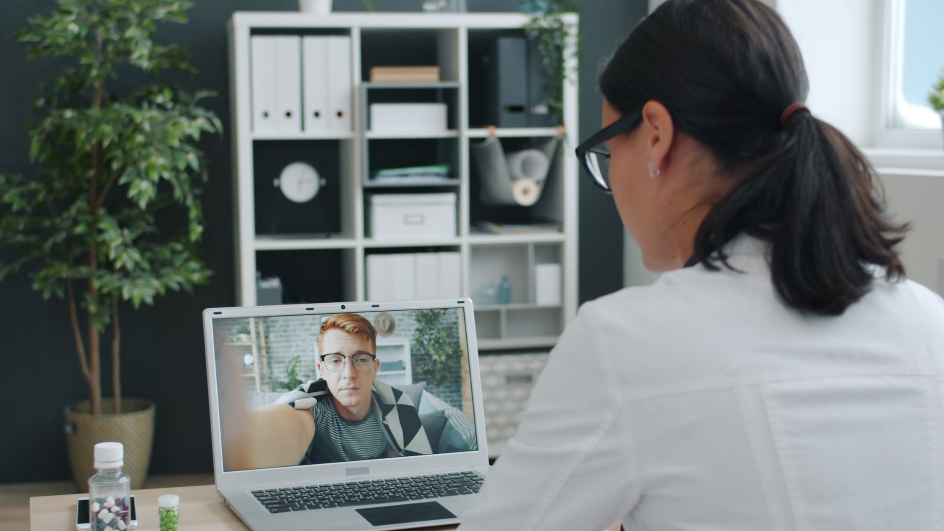Doctor engaged in a video call with patient
