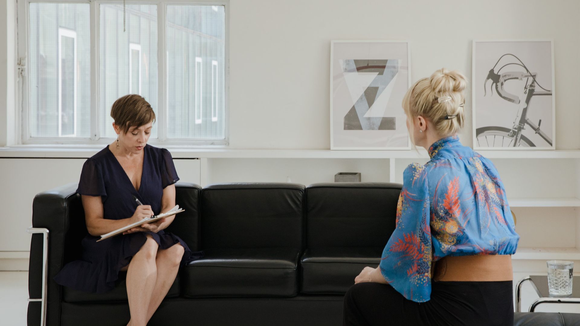 Two women engaging in a counseling session